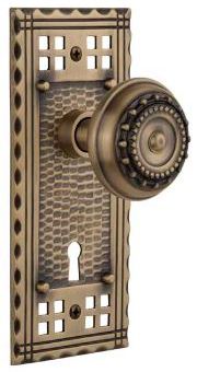 pacific doorknob with excelsior knob in antique brass