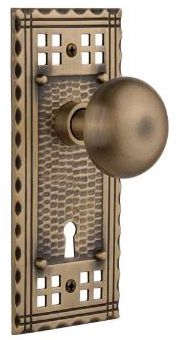 pacific doorknob with classic smooth knob in antique brass