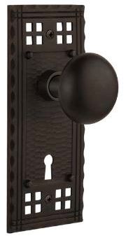 pacific doorknob with classic smooth knob in oil rubbed bronze