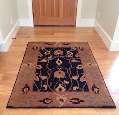 entry hall with estate rug