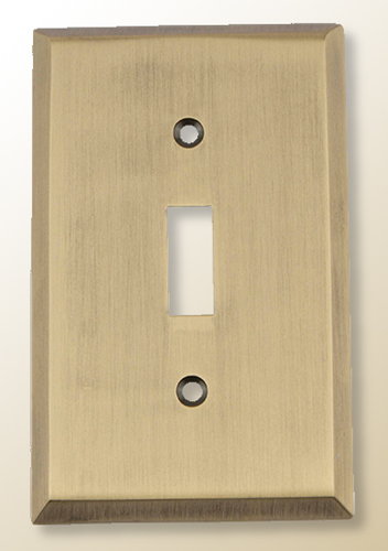 beveled light switch plate in antique brass